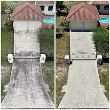 Roof-Wash-Power-Wash-Driveway-of-a-Beautiful-House 1